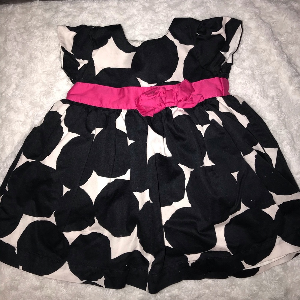 Polka dot dress with pink bow